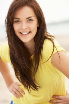Happy Teenage Girl Having Fun On Beach