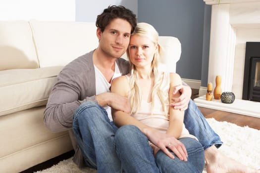 Romantic Young Couple Relaxing Together At Home