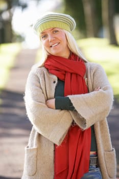 Portrait Of Woman Outdoors In Autumn Landscape