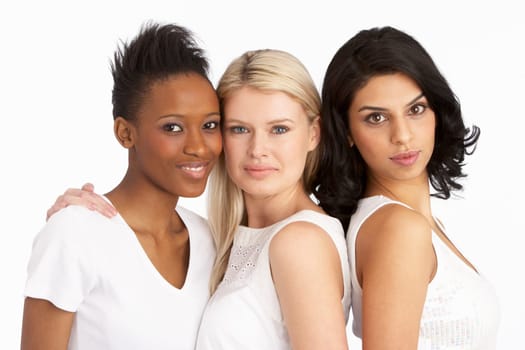 Portrait Of Three Attractive Young Women In Studio