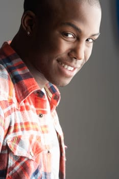 Fashionable Young Man Wearing Casual Clothes In Studio