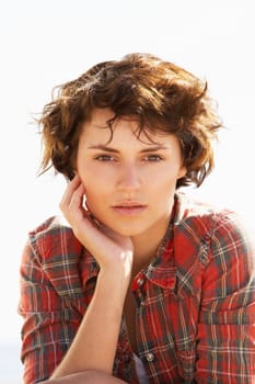 Young Woman Relaxing On Beach