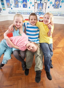 Group Of Primary Schoolchildren In Classroom
