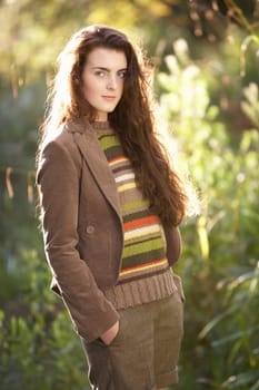 Portrait Of Beautiful Teenage Girl Outdoors In Autumn Landscape