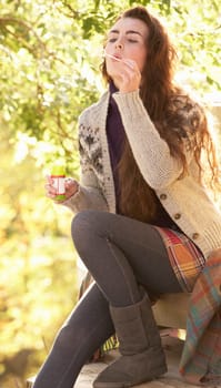 Portrait Of Beautiful Teenage Girl Outdoors In Autumn Landscape Blowing Bubbles