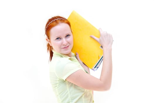 redhead young woman student holding a notebooks