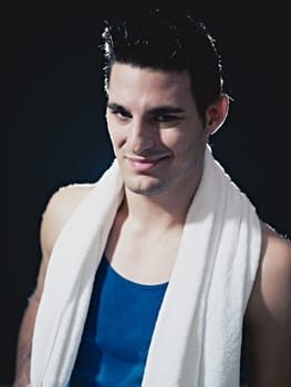 male athlete smiling and looking at camera