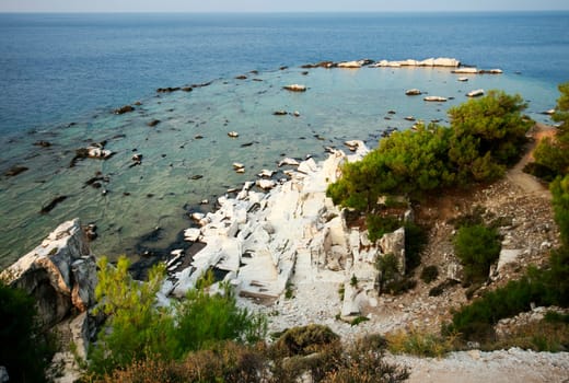Blocks of marble in the sea on Aliki