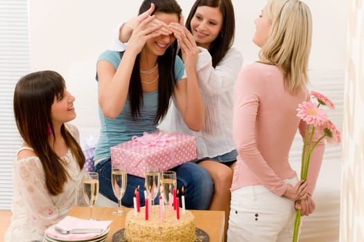 Birthday party - woman getting present and flower