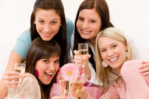 Birthday party celebration - four woman toast with champagne