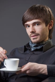 man with cup coffee