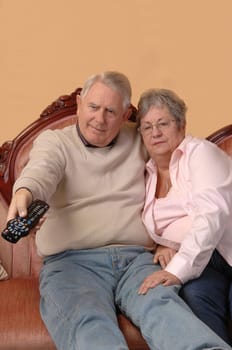 Seniors watching TV.