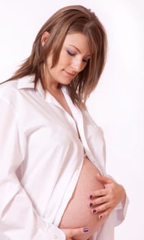 Portrait of beautiful pregnant woman hol