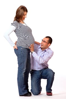 Happy young man and his pregnant wife