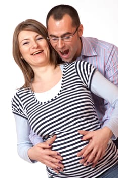 Happy young man and his pregnant wife
