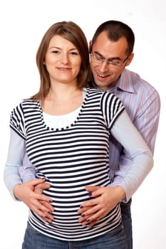 Happy young man and his pregnant wife