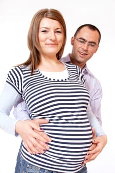 Happy young man and his pregnant wife