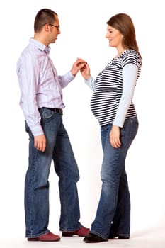 Happy young man and his pregnant wife