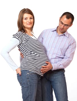 Happy young man and his pregnant wife