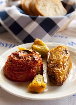 Stuffed pepper and tomato