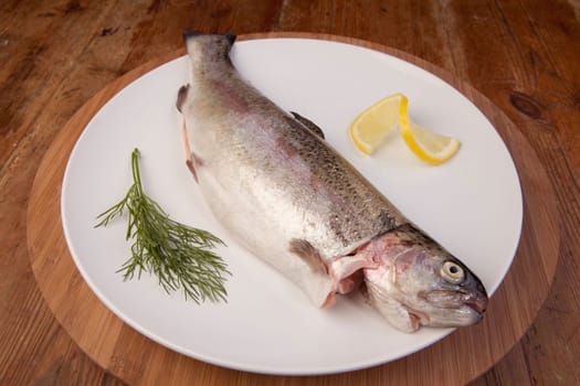 fish dinner of rainbow trout. fresh healthy meal on plate