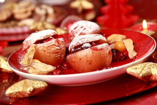 Delicious baked apple with cranberry stuffing for Christmas