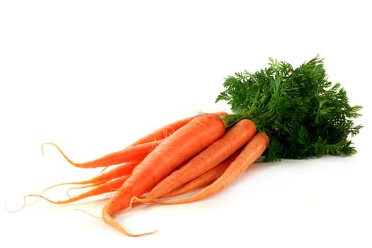 a bunch of carrots against a white background