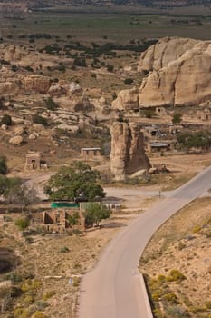 Enchanted Mesa is a sandstone butte in Cibola County, New Mexico, United States, about 2.5 miles (4.0 km) northeast of the pueblo of Acoma. It is called Mesa Encantada in Spanish and Katzimo or Kadzima in Keresan.