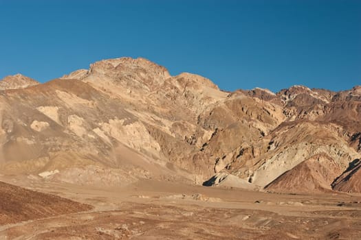 Artist&#039 s Drive rises up to the top of an alluvial fan fed by a deep canyon cut into the Black Mountains. Artist&#039 s Palette is on the face of the Black Mountains and is noted for having various colors of rock.