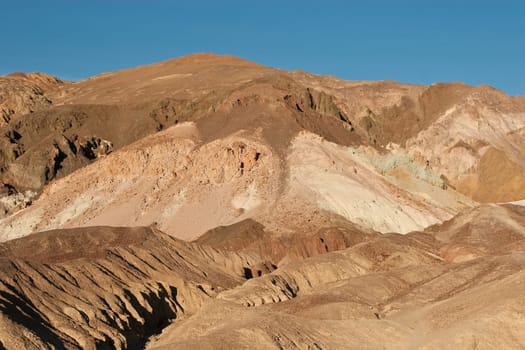 Artist&#039 s Drive rises up to the top of an alluvial fan fed by a deep canyon cut into the Black Mountains. Artist&#039 s Palette is on the face of the Black Mountains and is noted for having various colors of rock.
