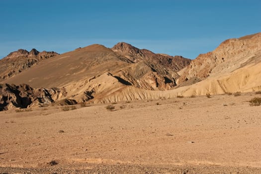 Artist&#039 s Drive rises up to the top of an alluvial fan fed by a deep canyon cut into the Black Mountains. Artist&#039 s Palette is on the face of the Black Mountains and is noted for having various colors of rock.
