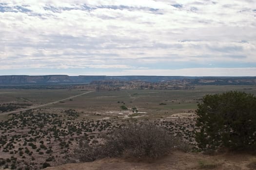 Enchanted Mesa is a sandstone butte in Cibola County, New Mexico, United States, about 2.5 miles (4.0 km) northeast of the pueblo of Acoma. It is called Mesa Encantada in Spanish and Katzimo or Kadzima in Keresan.