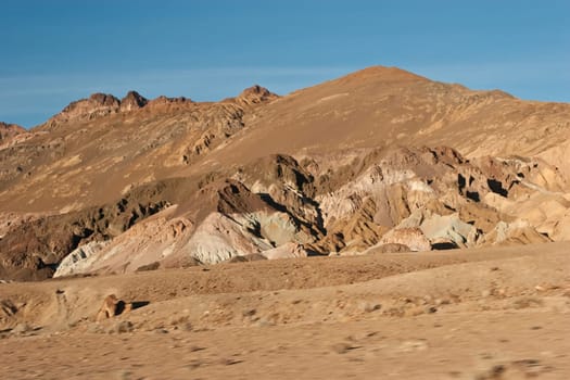 Artist&#039 s Drive rises up to the top of an alluvial fan fed by a deep canyon cut into the Black Mountains. Artist&#039 s Palette is on the face of the Black Mountains and is noted for having various colors of rock.