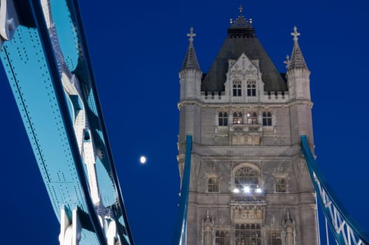 Low angle shot of Tower Bridge detail in London at dusk.
