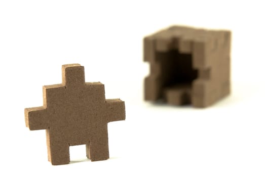 Foam material box with puzzle shaped sides.