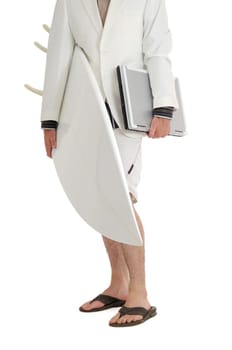 Man in white suit holding surfboard