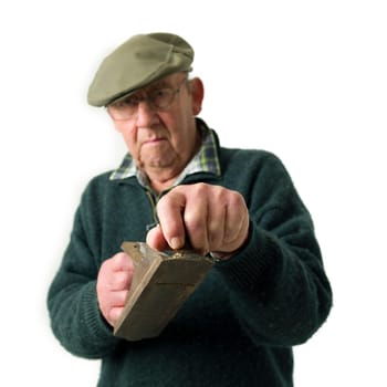 Senior Man holding old work tools