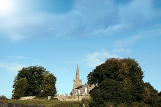a church on the hill in castletownroche a beautiful irish town in the country