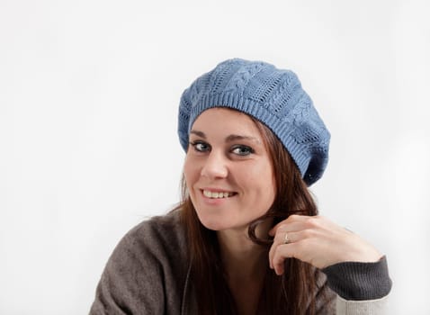 Young woman with a blue cap