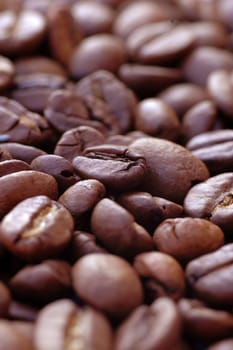 Coffee beans,with a focus on a coffee bean