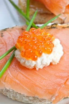 Salmon rolls with caviar
