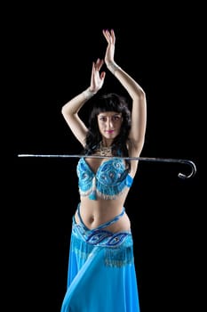 woman in blue costume  dance with cane