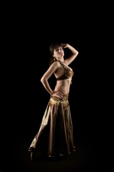 beautiful arabic woman dance in bronze dress