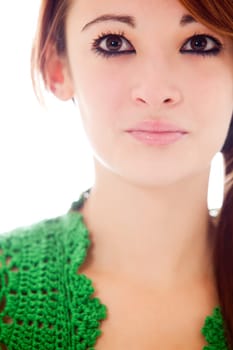 Beautiful brunette girl isolated in the studio
