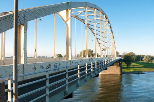 arch bridge over the river Ijssel, Netherlands