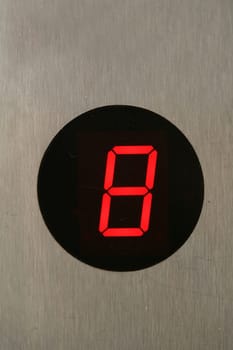 illuminating the image of a black background on the elevator buttons
