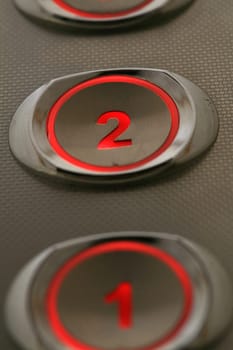 illuminating the image of a black background on the elevator buttons