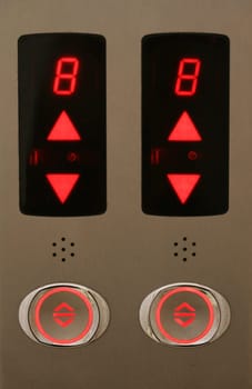 illuminating the image of a black background on the elevator buttons