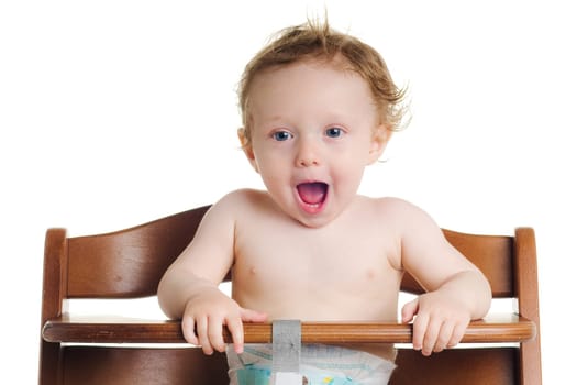Cute hungry baby in dining chair with white background