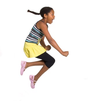 Expressive Young Mixed Race Girl leaping and jumping isolated against white background.